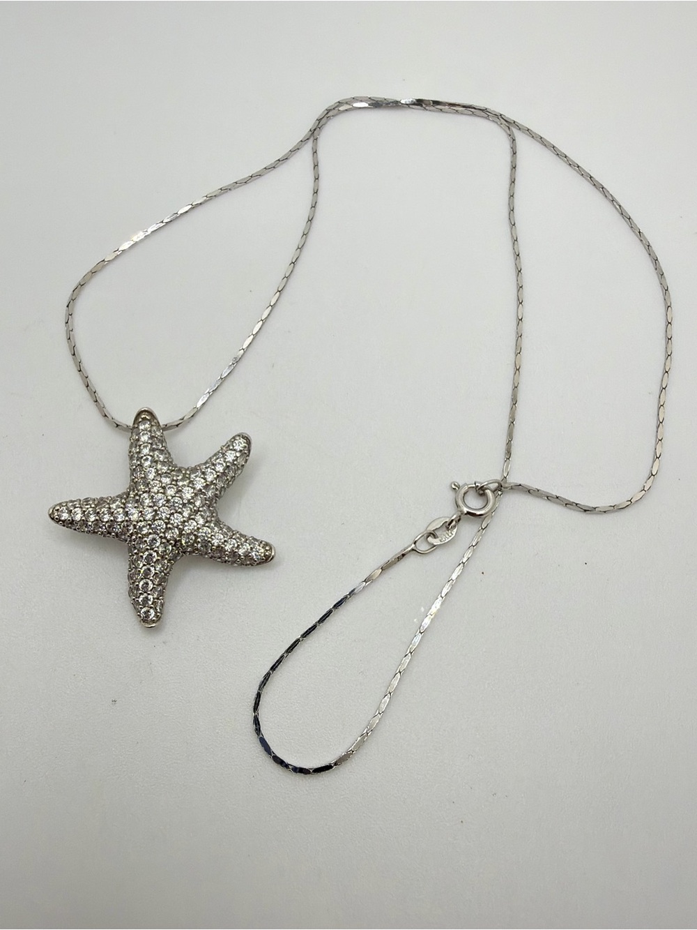 Rhodium over 925, rhinestone Starfish pendant on a 925, 20" Danecraft chain!